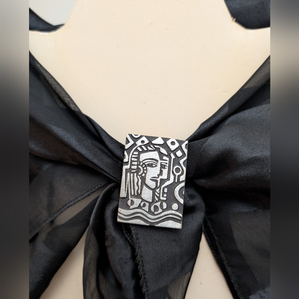 Handcrafted Silver-Tone Abstract Portrait Brooch in Black